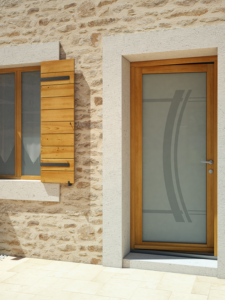 Réalisation porte en bois à Saint-Étienne-de-Montluc (44) - Menuiserie du Héron - Maître Artisan Spécialiste Rénovation